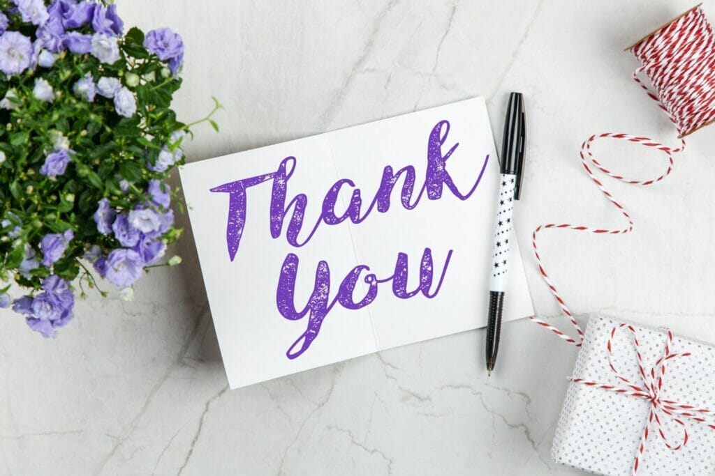 A beautifully crafted thank you card, adorned with vibrant and delicate flowers. The card exudes heartfelt appreciation and is a meaningful gesture of gratitude to express thanks to the church family after surgery