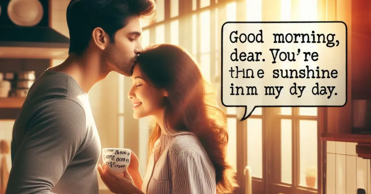 A couple enjoys morning coffee in their kitchen as the sun rises outside. The man affectionately calls his girlfriend "dear" while kissing her forehead, prompting thoughts on "what does it mean when a guy calls you dear.